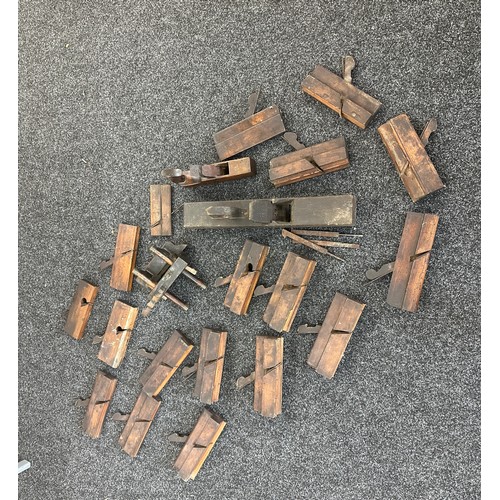 180 - Large box of antique wooden moulding planes and other wood working tools