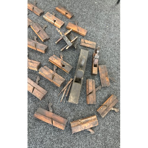 180 - Large box of antique wooden moulding planes and other wood working tools