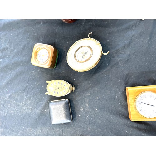 141 - Large selection of assorted clocks includes wall clock, brass cased clock