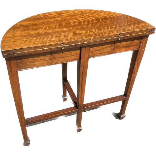 388 - Mahogany half moon card table measures approx 32 inches wide and 22 inches tall