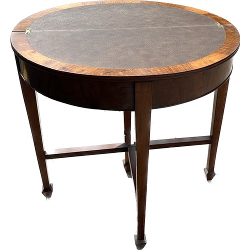 388 - Mahogany half moon card table measures approx 32 inches wide and 22 inches tall