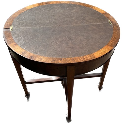 388 - Mahogany half moon card table measures approx 32 inches wide and 22 inches tall