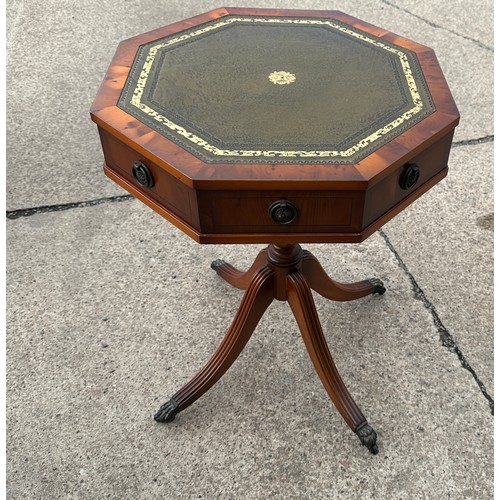 392 - Reproduction leather topped drum table measures approx 26 inches tall