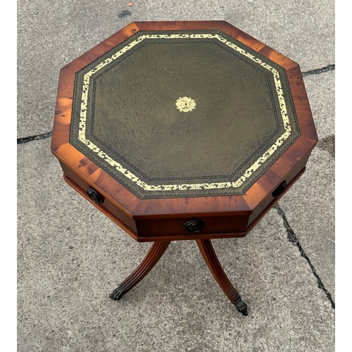 392 - Reproduction leather topped drum table measures approx 26 inches tall