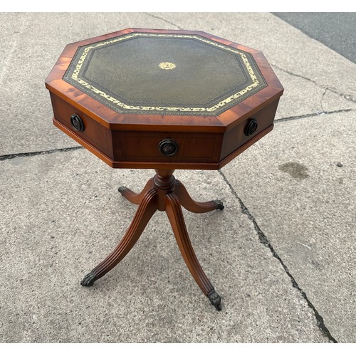 392 - Reproduction leather topped drum table measures approx 26 inches tall