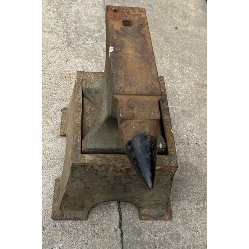 100D - Vintage anvil with original stand measures approx 21 inches tall by 21 inches wide