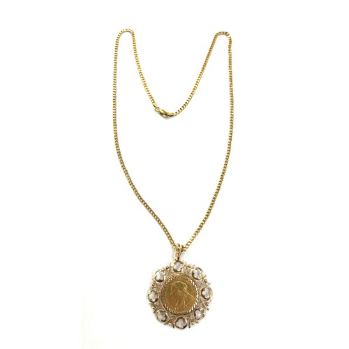 68 - 22ct Gold 1898 queen Victoria Sovereign in a 9ct gold pendant of a 9ct gold chain total weight 22.4 ... 