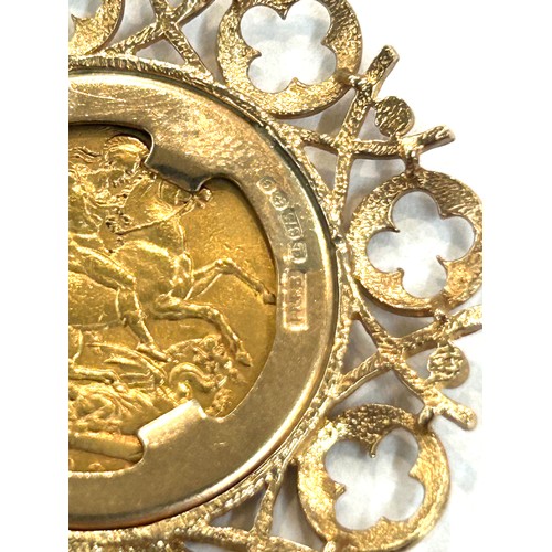 68 - 22ct Gold 1898 queen Victoria Sovereign in a 9ct gold pendant of a 9ct gold chain total weight 22.4 ... 