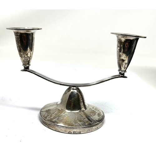 17 - Vintage silver candelabra measures approx height 11cm by 15cm wide filled base