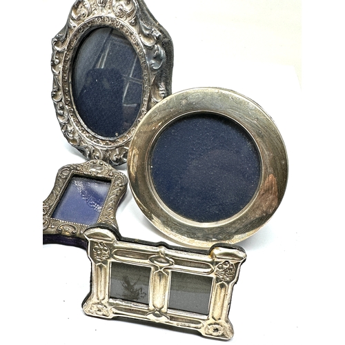 26 - 5 small silver picture frames largest measures approx 13cm by 10cm