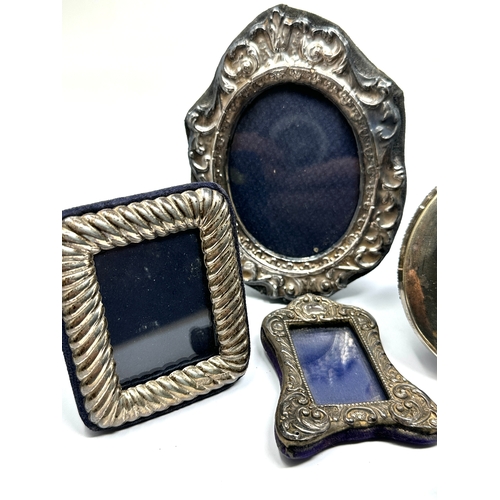 26 - 5 small silver picture frames largest measures approx 13cm by 10cm