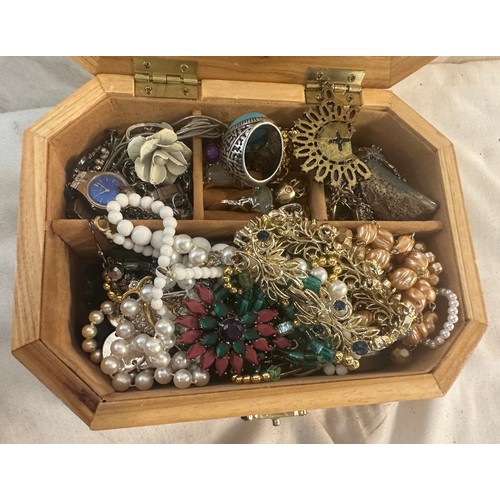 455 - Selection of costume jewellery to include necklaces, rings etc in a wooden embroidered jewellery box