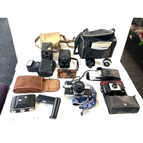 82 - Selection of cameras and equipments includes Praktica mtl5b, Pentax etc all untested