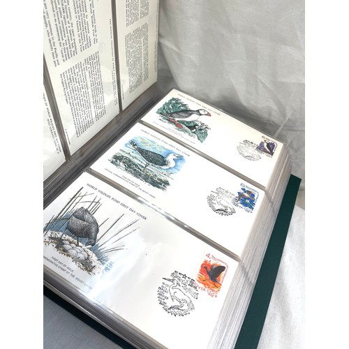 76 - Selection of 3 albums of first day covers includes the official collection of world's first wildlife... 