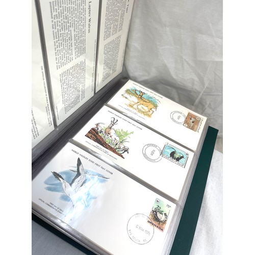 76 - Selection of 3 albums of first day covers includes the official collection of world's first wildlife... 