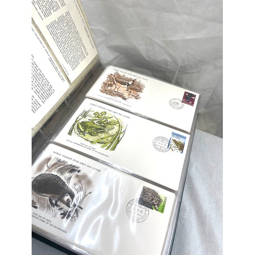 76 - Selection of 3 albums of first day covers includes the official collection of world's first wildlife... 