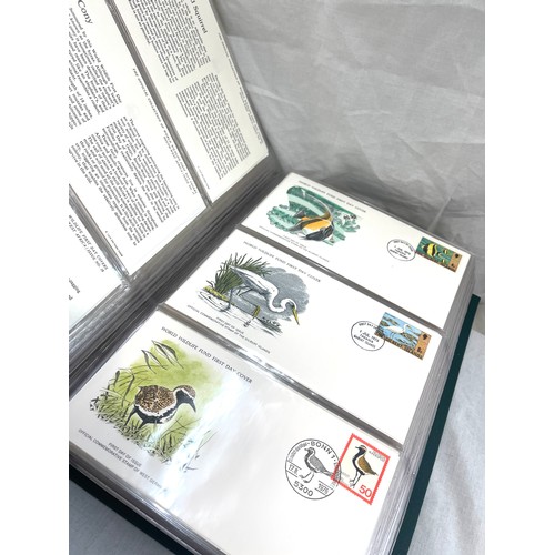 76 - Selection of 3 albums of first day covers includes the official collection of world's first wildlife... 