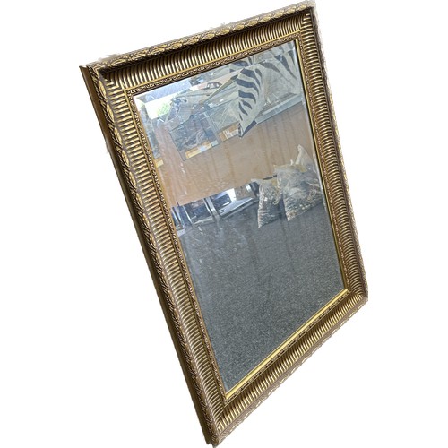 259 - Large gilt framed mirror measures approx 35 inches  by 26 inches