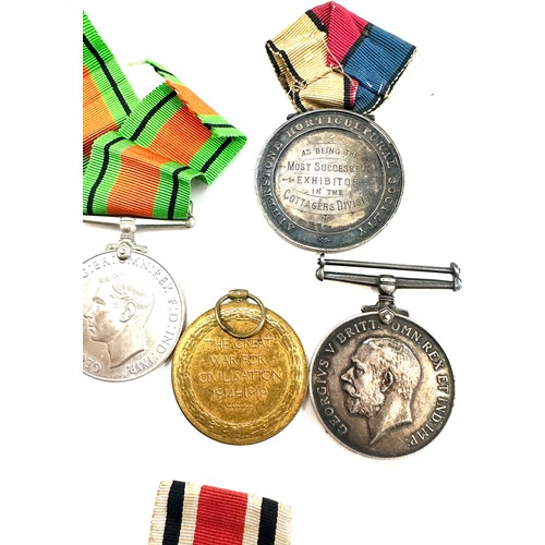 504 - Selection of WW1 and WW2 medals, named PTE. V.R. Vero. R.War.R and a silver silver successful medal