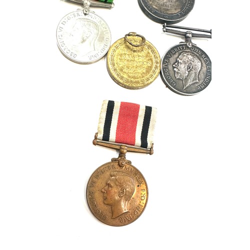 504 - Selection of WW1 and WW2 medals, named PTE. V.R. Vero. R.War.R and a silver silver successful medal