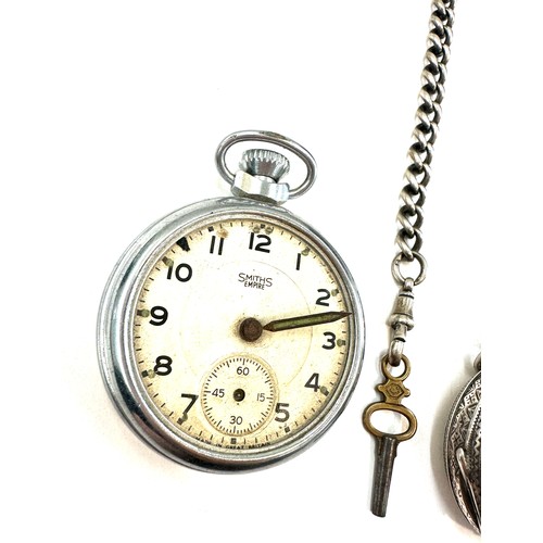 511 - Vintage silver fob watch with a silver albert chain along with a smith pocket watch