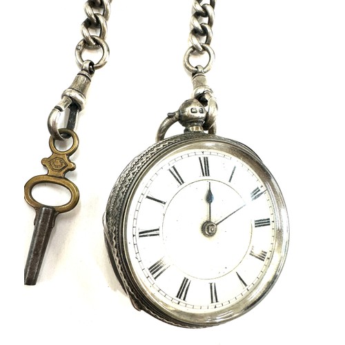 511 - Vintage silver fob watch with a silver albert chain along with a smith pocket watch