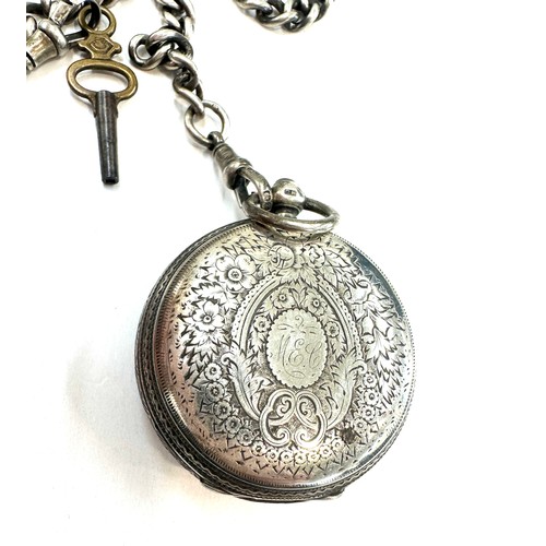 511 - Vintage silver fob watch with a silver albert chain along with a smith pocket watch