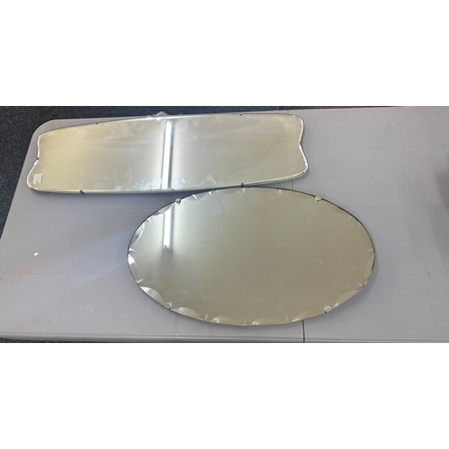 71 - 2 Frameless beveled edge mirrors largest measures approximately 35 inches wide 12 inches wide