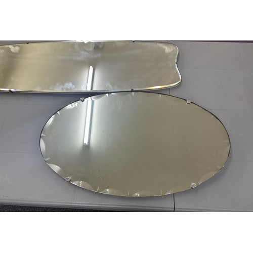 71 - 2 Frameless beveled edge mirrors largest measures approximately 35 inches wide 12 inches wide