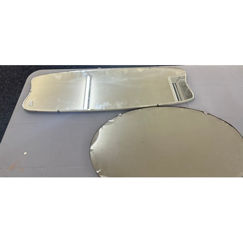 71 - 2 Frameless beveled edge mirrors largest measures approximately 35 inches wide 12 inches wide