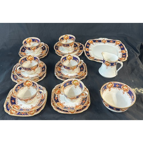 567 - Part Royal Albert tea service includes 6 cups, saucers, side plates etc