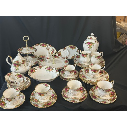 486 - Royal Albert Old Country Rose Tea Service to include 6 cups,6 saucers,cake stand etc . Approximately... 