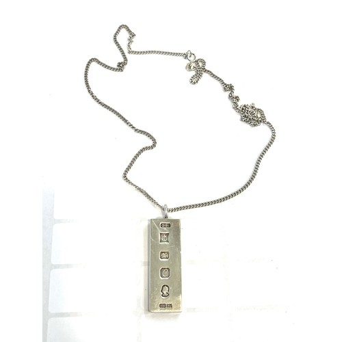 494 - Silver ingot on a silver chain, total weight 36.3 grams