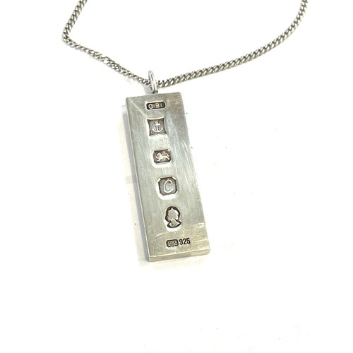 494 - Silver ingot on a silver chain, total weight 36.3 grams