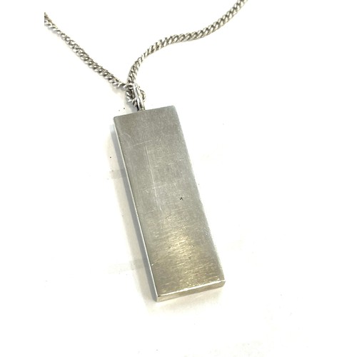 494 - Silver ingot on a silver chain, total weight 36.3 grams