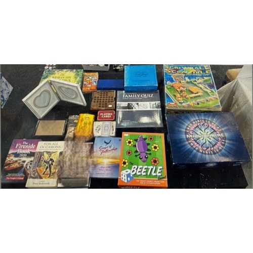 148A - Selection of vintage and later games, books to include The Beetle, Who wants to be a millionaire etc