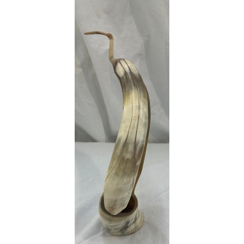 70 - Carved horn figure of a pelican, approximate height 13.5 inches