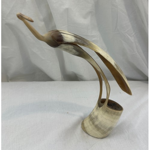 70 - Carved horn figure of a pelican, approximate height 13.5 inches