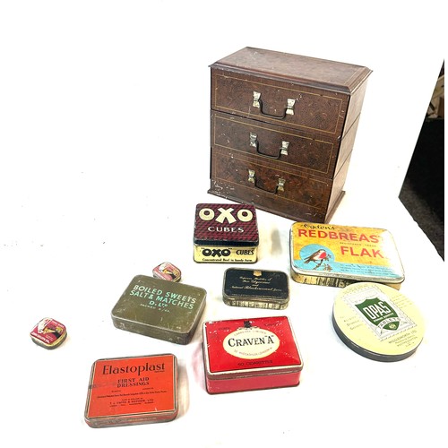 99 - Selection of vintage tins and a storage cabinet