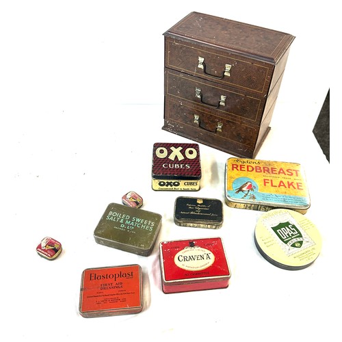 99 - Selection of vintage tins and a storage cabinet