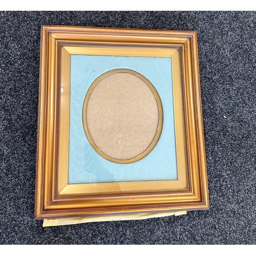 37 - Vintage photo frame with upholstered border measures approximately 25 inches long by 23 wide