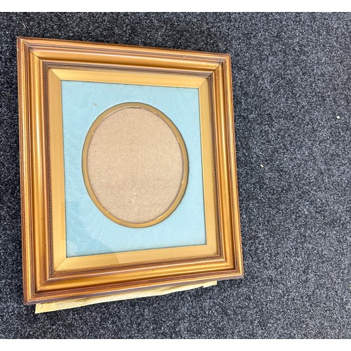 37 - Vintage photo frame with upholstered border measures approximately 25 inches long by 23 wide