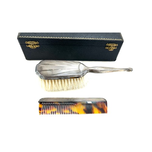 493 - Cased silver brush and comb set