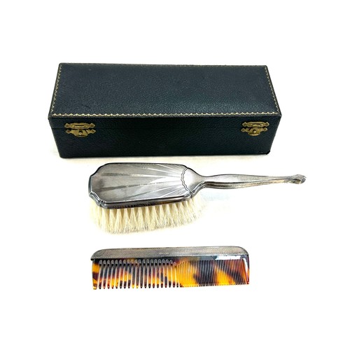 493 - Cased silver brush and comb set