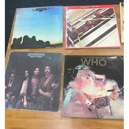 36 - Selection of vinyl LPS including the Eagles, The Beatles etc