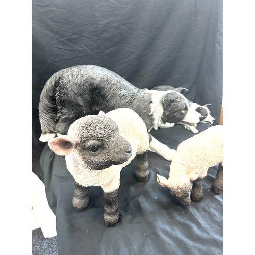 276 - Khotant Resin sheep dog and sheep figures largest measures 14 inches tall 24 inches long