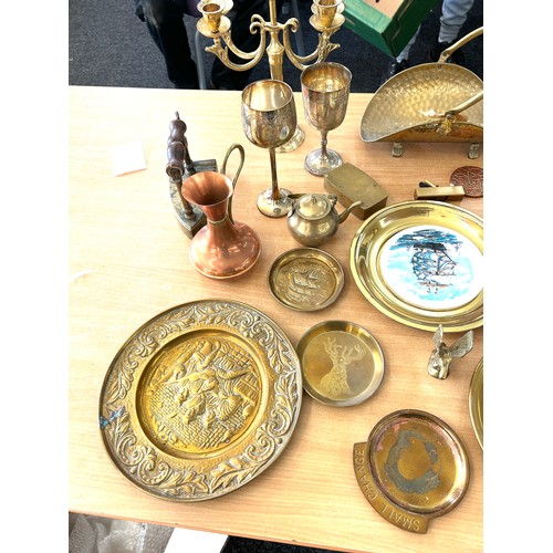 245 - Selection of brassware to include candle harb, horse brasses, miniature candle sticks etc