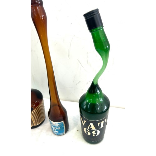 277 - Selection of vintage novelty bottles includes tia maria etc tallest measures approximately 17 inches