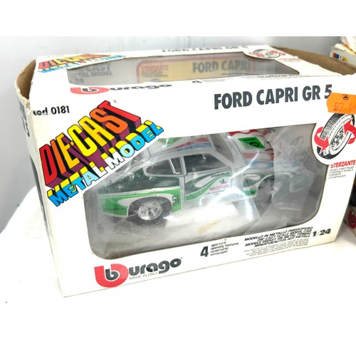 112 - Boxed Burago fort escort rs1800, Fiat abarth 131, mercedes capri etc