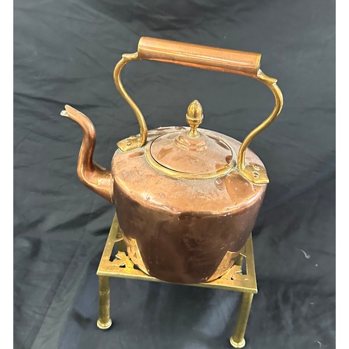 55 - Copper kettle on stand, height of kettle approximately 10 inches